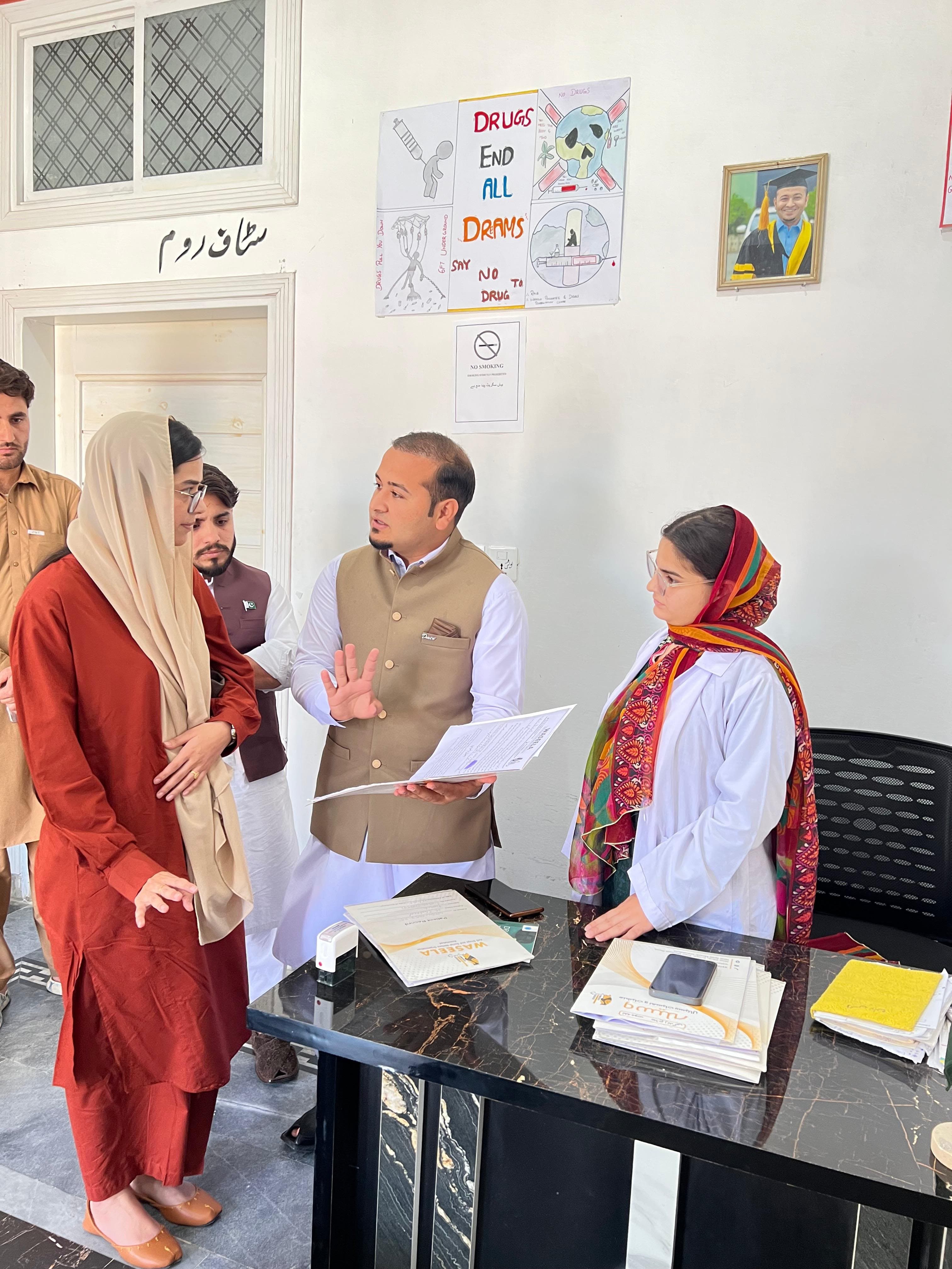 Visitors reviewing patient records with our team
